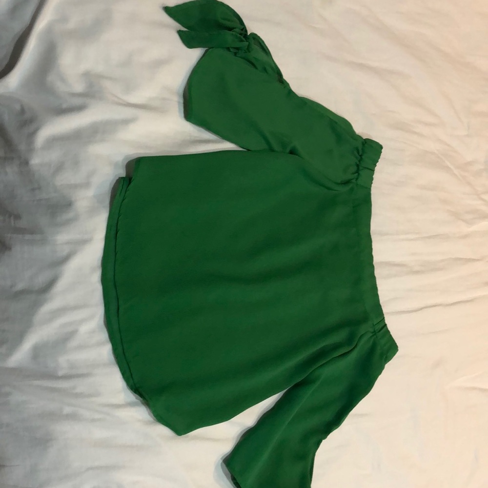Off the shoulder green blouse from a boutique